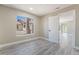 Inviting bedroom boasts a window and contemporary flooring at 4498 Via San Rafael, Las Vegas, NV 89103
