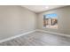 Well-lit bedroom with a bright window and modern flooring at 4498 Via San Rafael, Las Vegas, NV 89103