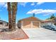 Charming single-story home features a two-car garage, desert landscaping, and a well-maintained front yard at 4498 Via San Rafael, Las Vegas, NV 89103