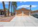 Charming single-story home features a two-car garage, desert landscaping, and a well-maintained front yard at 4498 Via San Rafael, Las Vegas, NV 89103