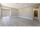 Spacious living room with new floors, recessed lighting, fresh paint and sliding glass door to the back yard at 4498 Via San Rafael, Las Vegas, NV 89103