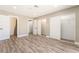 Spacious main bedroom featuring wood-style floors, neutral paint, and ample closet space at 4498 Via San Rafael, Las Vegas, NV 89103