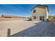 Spacious backyard awaiting personalization, featuring block wall and low-maintenance landscaping at 4539 Cotton Quail Ave, Las Vegas, NV 89115