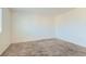This bedroom is painted with neutral tones and is equipped with plush carpeting and a window at 4539 Cotton Quail Ave, Las Vegas, NV 89115