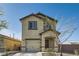 Charming two-story home featuring a quaint covered porch and attached one-car garage at 4539 Cotton Quail Ave, Las Vegas, NV 89115