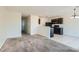 Bright and airy open-concept layout seamlessly connecting the kitchen, dining, and living spaces at 4539 Cotton Quail Ave, Las Vegas, NV 89115