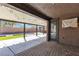 Covered patio features brick and concrete flooring and recessed lighting, ideal for outdoor living at 4818 Al Carrison St, Las Vegas, NV 89149