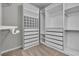A well-organized walk-in closet featuring custom shelving and ample storage space at 4818 Al Carrison St, Las Vegas, NV 89149