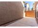 Low maintenance backyard with a concrete patio and block wall at 519 Brinkburn Point Ave, Las Vegas, NV 89178
