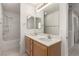 Bathroom featuring double sinks and a shower-tub combo at 519 Brinkburn Point Ave, Las Vegas, NV 89178