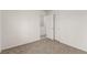 This bedroom features carpet and two closets at 519 Brinkburn Point Ave, Las Vegas, NV 89178
