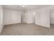Large unfurnished bedroom with two doors and plush carpet; versatile space at 519 Brinkburn Point Ave, Las Vegas, NV 89178