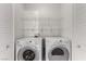 Convenient laundry closet with side by side washer and dryer at 519 Brinkburn Point Ave, Las Vegas, NV 89178