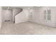 Spacious living room featuring tile floors and white plantation shutters at 519 Brinkburn Point Ave, Las Vegas, NV 89178
