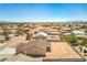 Expansive aerial view of a home with a large, fenced backyard and desert surroundings at 5251 Graystone, Pahrump, NV 89061