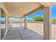 Covered back patio overlooking a blank canvas backyard, ready for customization at 5251 Graystone, Pahrump, NV 89061