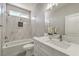 Bathroom featuring tub and shower combo with stylish marble-like tile surround at 5251 Graystone, Pahrump, NV 89061