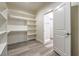 Walk-in closet with built in shelves, and rod for hanging clothes and storage at 5251 Graystone, Pahrump, NV 89061