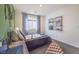 Bright bedroom with BMX decor, featuring a comfy bed, desk area, and stylish storage shelves at 5714 Sunset Sedona St # Lot 5, North Las Vegas, NV 89081