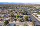 Expansive neighborhood aerial view with mountain range in the background at 5772 Arbor Oak Cir, Las Vegas, NV 89142