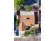 Bird's-eye view of a home featuring a well-maintained roof, mature trees, and a private backyard retreat at 5772 Arbor Oak Cir, Las Vegas, NV 89142