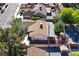 Aerial view of the home, including a covered patio and fenced backyard at 5772 Arbor Oak Cir, Las Vegas, NV 89142