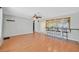 Open living space with hardwood floors and a bar area connecting to the kitchen at 5772 Arbor Oak Cir, Las Vegas, NV 89142