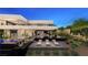A stunning backyard featuring a modern pool, lounge chairs, and desert landscaping for outdoor enjoyment at 607 Grand Rim Dr, Henderson, NV 89012