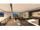 Entertainment area with a fully equipped bar, pool table, and stunning city views for ultimate relaxation at 607 Grand Rim Dr, Henderson, NV 89012