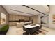 Modern kitchen with an adjacent dining area, wooden cabinetry, and contemporary decor, perfect for Gathering gatherings at 607 Grand Rim Dr, Henderson, NV 89012