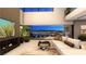 Comfortable living room boasts a fireplace, city views, and modern decor at 607 Grand Rim Dr, Henderson, NV 89012