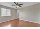 Bedroom features include a modern ceiling fan and a window for natural light at 6116 Camas Canyon Ave, Las Vegas, NV 89130