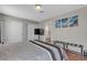 Bedroom featuring hardwood floors, closet storage, and ensuite bathroom at 6116 Camas Canyon Ave, Las Vegas, NV 89130