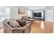 Inviting living room with hardwood floors, neutral walls and comfortable seating at 6116 Camas Canyon Ave, Las Vegas, NV 89130