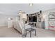 Upstairs living room featuring a ceiling fan and media center at 6116 Camas Canyon Ave, Las Vegas, NV 89130