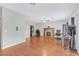 Spacious living room featuring a fireplace, ceiling fan, and open floor plan at 6116 Camas Canyon Ave, Las Vegas, NV 89130