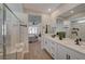 Bathroom showcasing an open concept from the shower, double vanity, and into the bedroom at 6544 Sandero Springs St, Las Vegas, NV 89166