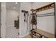 Mudroom featuring coat rack, shelving, and patterned flooring at 6544 Sandero Springs St, Las Vegas, NV 89166