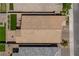 Overhead view of a well-maintained home with a landscaped backyard, showcasing the roof and surroundings at 713 Webber Park St, Henderson, NV 89011