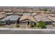 Aerial view of a well-maintained neighborhood with uniform houses and landscaping at 713 Webber Park St, Henderson, NV 89011