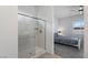 Ensuite bathroom features a shower and access to the primary bedroom at 713 Webber Park St, Henderson, NV 89011