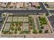 Aerial view of community sports courts, including tennis and bocce ball, with manicured landscape at 713 Webber Park St, Henderson, NV 89011