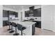 Contemporary kitchen featuring stainless steel appliances, island seating and sleek cabinetry at 713 Webber Park St, Henderson, NV 89011