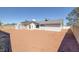 Wide backyard featuring a neutral desert landscape, providing a clean and versatile outdoor space at 720 Sam Jonas Dr, Las Vegas, NV 89145