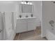 Bathroom featuring a sleek vanity, modern fixtures, and a convenient shower and tub combination at 720 Sam Jonas Dr, Las Vegas, NV 89145