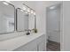 Modern bathroom with white cabinets, quartz countertop, black faucet, and updated fixtures at 720 Sam Jonas Dr, Las Vegas, NV 89145