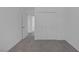 Bedroom with neutral carpet, closet, and view to another room at 720 Sam Jonas Dr, Las Vegas, NV 89145