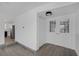 Bright foyer with new wood-look flooring and direct access to the entryway and kitchen at 720 Sam Jonas Dr, Las Vegas, NV 89145
