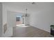 Living room with fireplace, sliding door access to backyard, and new flooring at 720 Sam Jonas Dr, Las Vegas, NV 89145