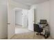 A small office nook with a desk is situated just off the doorway of this bedroom at 7572 Hope Valley St, Las Vegas, NV 89139